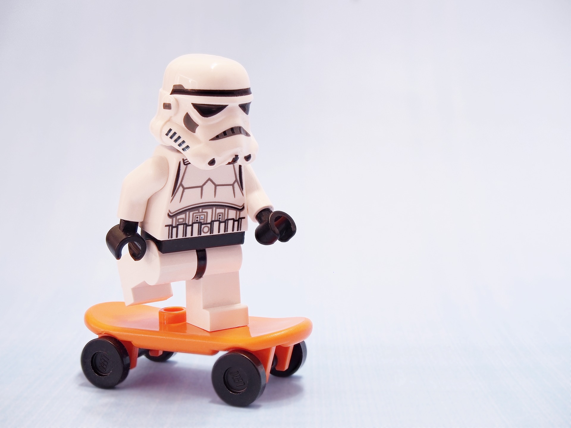 lego stormrooper on a skateboard